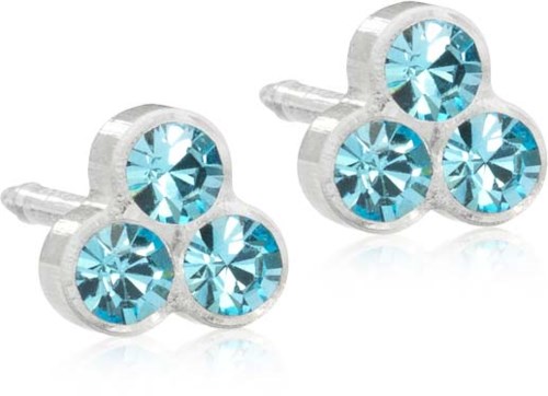 Silver earrings with three blue gemstones in each earring. The gemstones are circular and shiny.