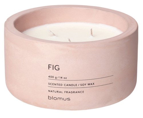 A large pink scented soy wax candle with three wick flames and minimal black text on the side.