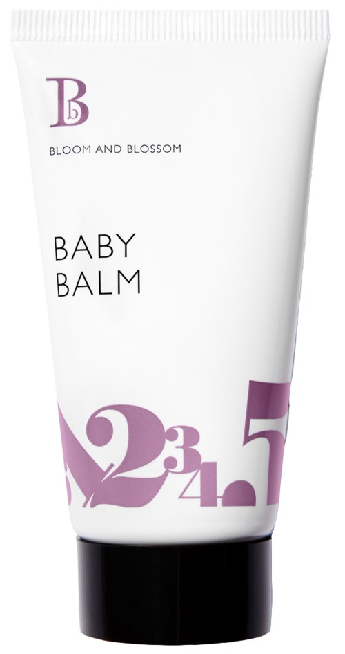 En vit tub märkt 'Baby Balm' med lila siffror och bokstäver, och en svart lock längst ner.