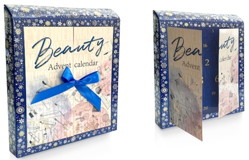 En dekorerad beauty-adventskalender med blå rosett och snöflingemönster, visar att den öppnas för att avslöja numrerade dagar.