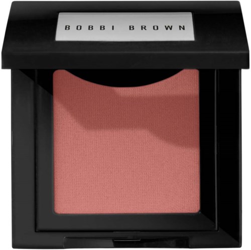 En rosa rouge i ett svart kompakthölje med ett genomskinligt lock som visar 'BOBBI BROWN' text.