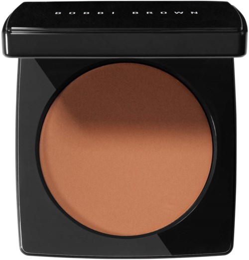 A compact round makeup container with a dark lid and tan powder inside. The lid has 'BODHI BROWN' written on it.