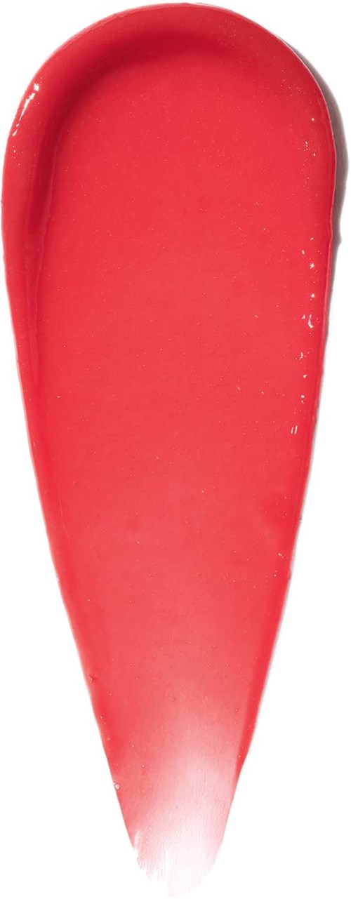 En röd, böjd, glacé dessert i skedform. Den ser slät och glansig ut.