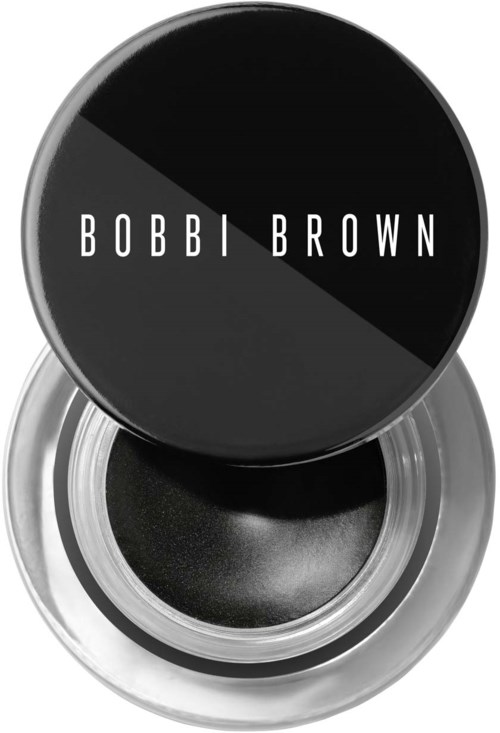 Een zwarte oogschaduw in een ronde container met een deksel met het Bobbi Brown-logo in witte letters.