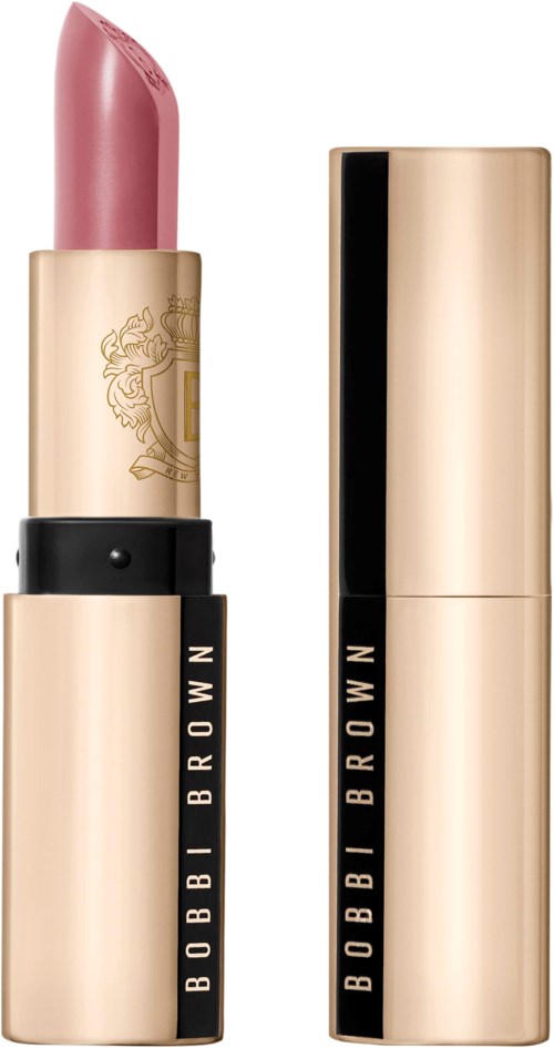 Roze lippenstift in een goudkleurige huls met een zwart band met de naam Bobbi Brown.