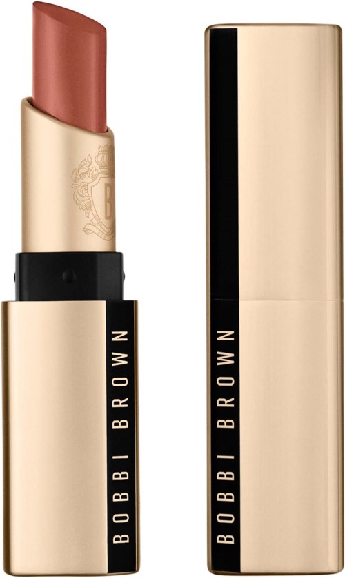 A lipstick in a gold case with a black band, open to show the brownish lipstick inside.