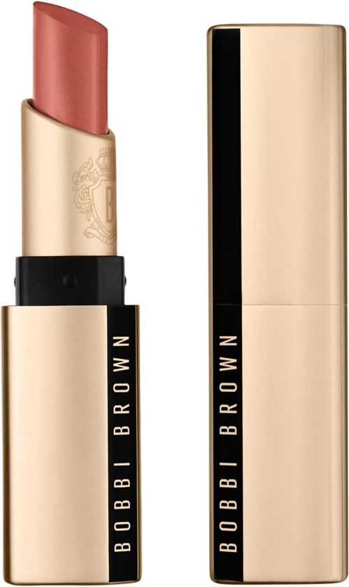 Złoty szminka z czarną paską, logo Bobbi Brown i różowa szminka w środku.