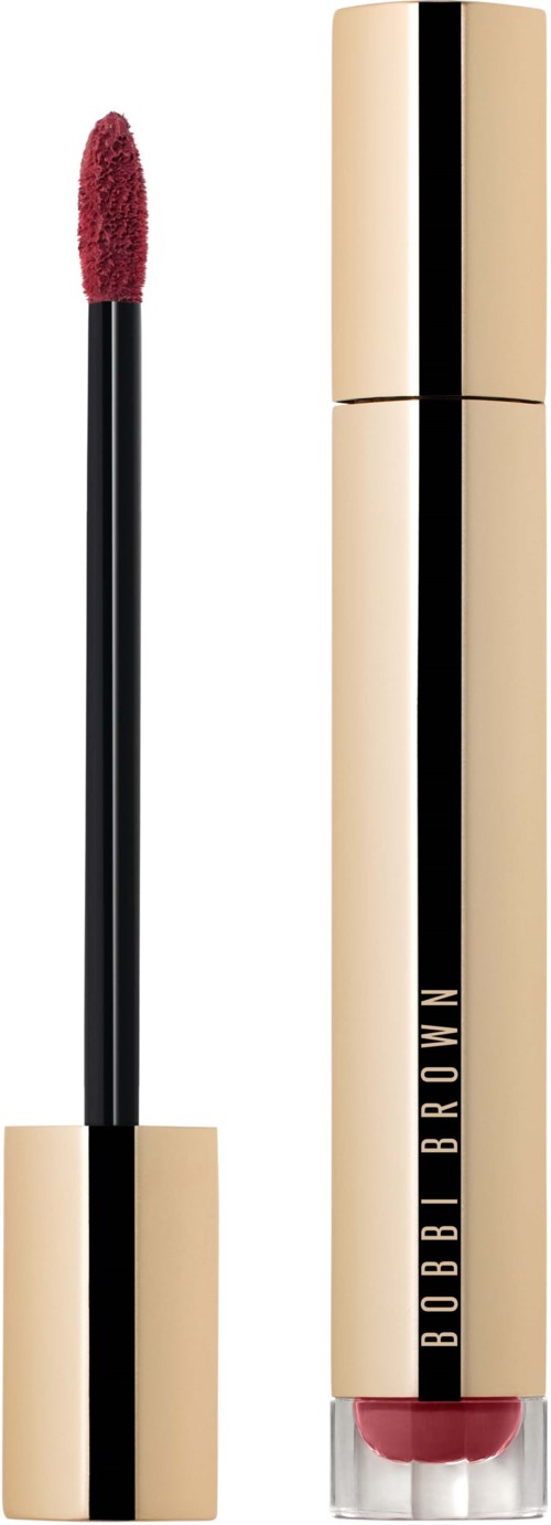 A lip gloss tube with a gold finish, black cap, and red gloss applicator wand. Bobbi Brown logo on the tube.