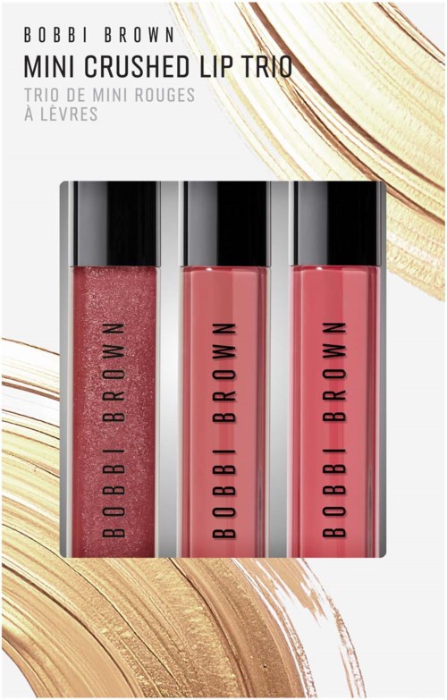 Tre Bobbi Brown mini crushed læbepomader i lyserøde nuancer med sorte låg, vist på hvid baggrund med gulddetaljer.