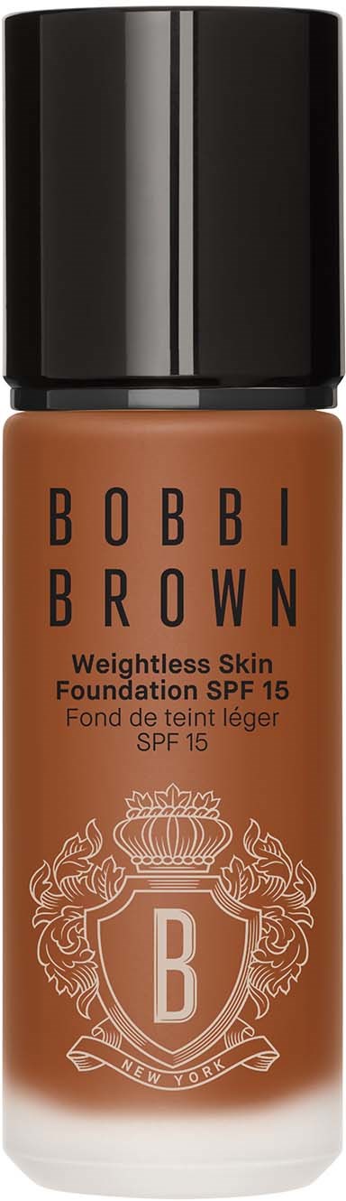 En flaska Bobbi Brown-foundation med SPF 15, i en brun behållare med svart lock och logotyp.