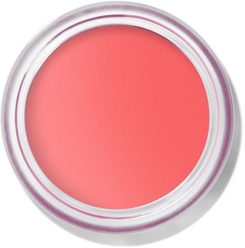 Ett runt ansiktsrouge- eller kosmetikask med rosa produkt inuti. Förpackningen har en glänsande, silverfärgad kant.