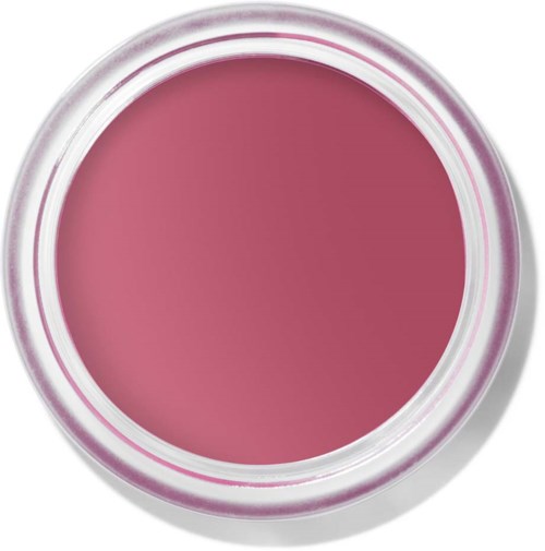 En rund behållare med rosa läppbalsam inuti, sedd uppifrån.