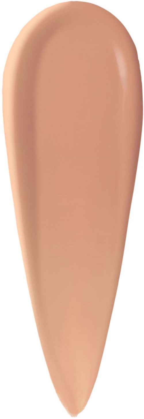 A beige makeup concealer swatch in a teardrop shape on a white background.