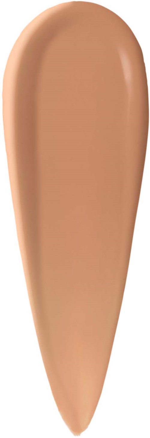 Swatch of light beige foundation in a teardrop shape.