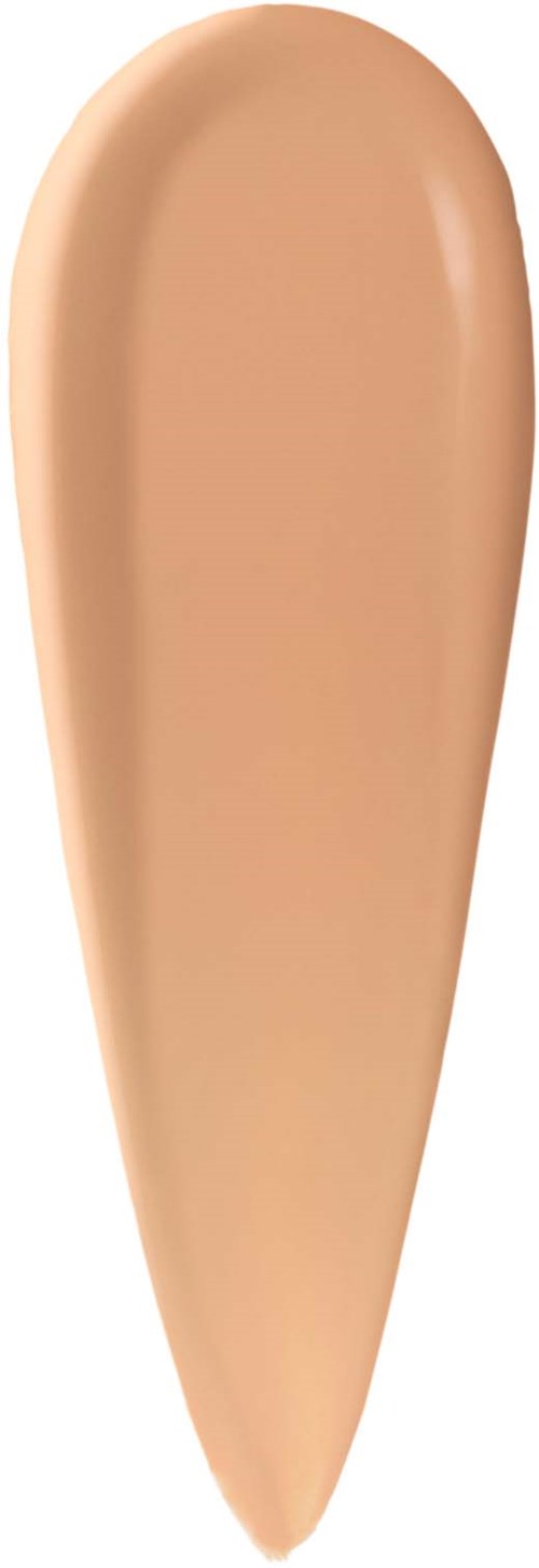 A swatch of beige foundation makeup on a white background.