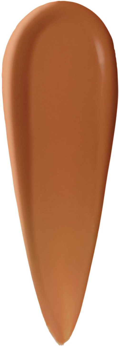 Swatch of medium brown liquid foundation with smooth, creamy texture.