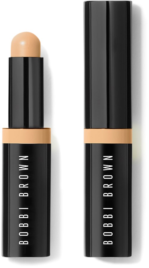 Lippenpflegestift mit schwarzem Gehäuse und transparentem Spitz, mit 'BOBBI BROWN' auf der Tube.