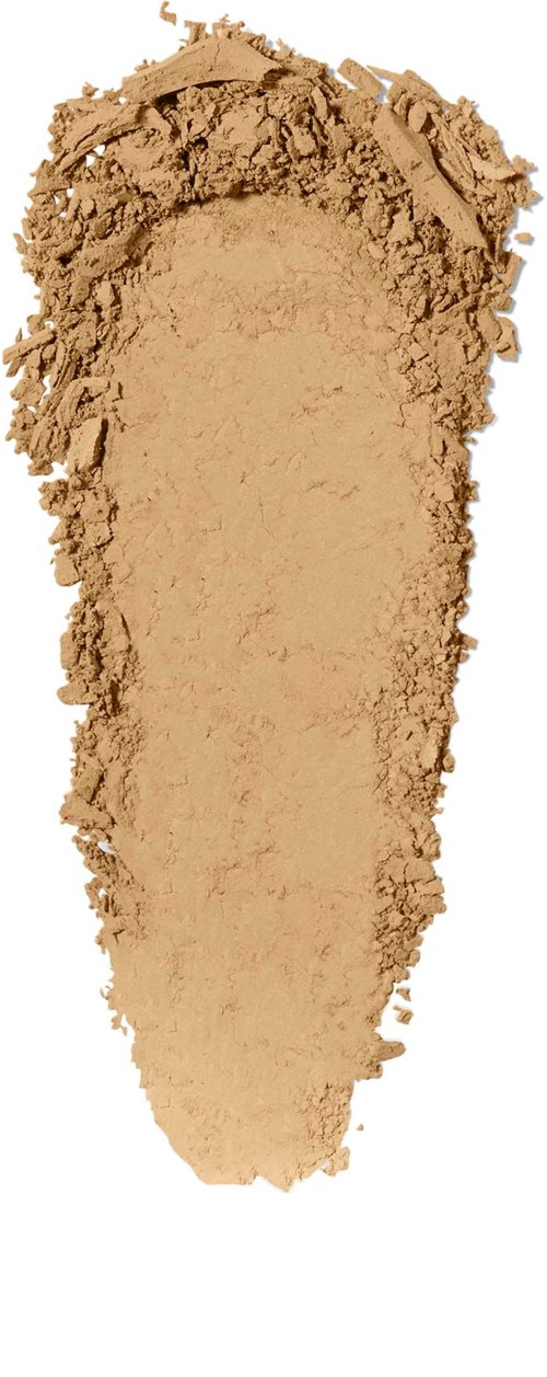Een beige poeder uitgespreid in een kegelvorm, met ruwe randen en een vlak oppervlak.