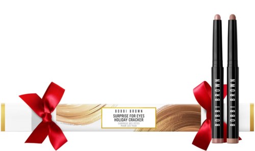 Box mit Bobbi Brown Lidschattenstiften, rote Schleifen und goldene Akzente, beschriftet als Surprise for Eyes Holiday Cracker.