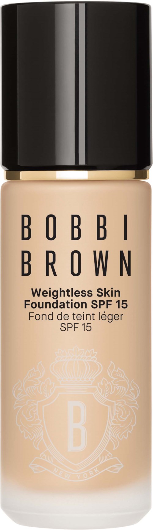 Flaska med Bobbi Brown foundation med SPF 15 och lätt formula, märkt i svart och beige.