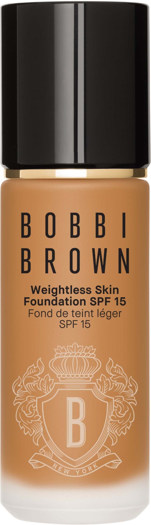 Foundationflaska med svart lock, beige färg, och Bobbi Brown logga och text.