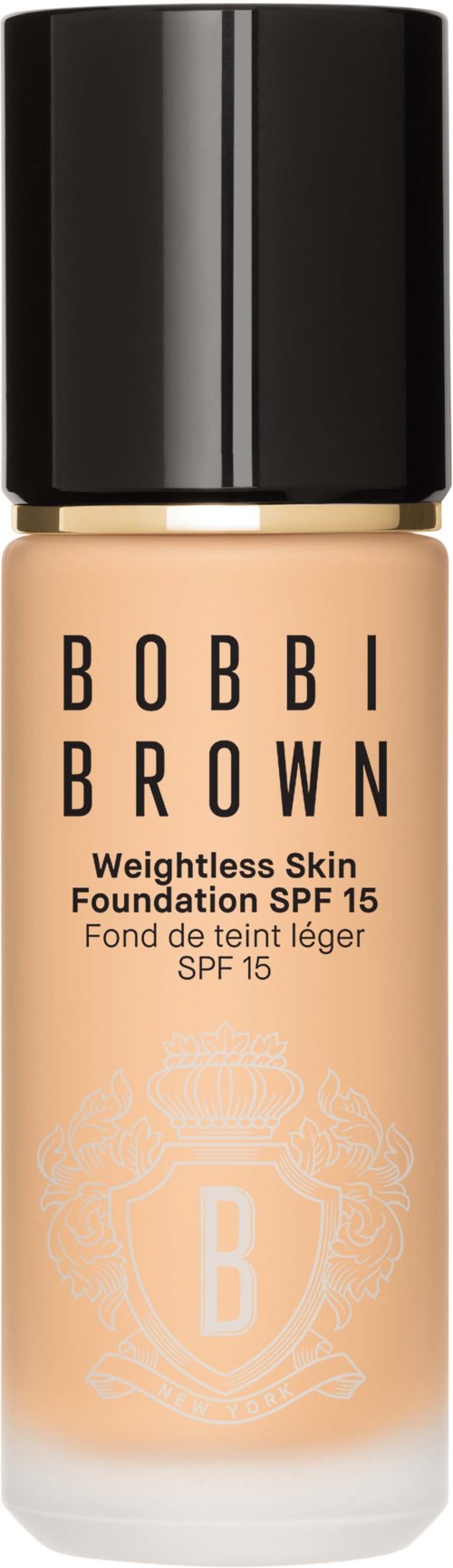 En foundationflaska med svart lock, märkt Bobbi Brown, SPF 15, för viktlös hud.
