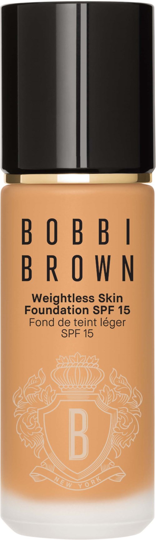 En flaska med Bobbi Brown Weightless Skin Foundation med SPF 15, ljus beige färg, svart lock och logga på flaskan.