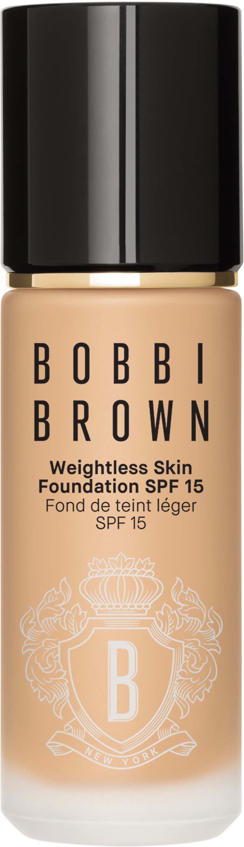 Foundationflaska med SPF 15, märkt Bobbi Brown, i beige med svart lock.
