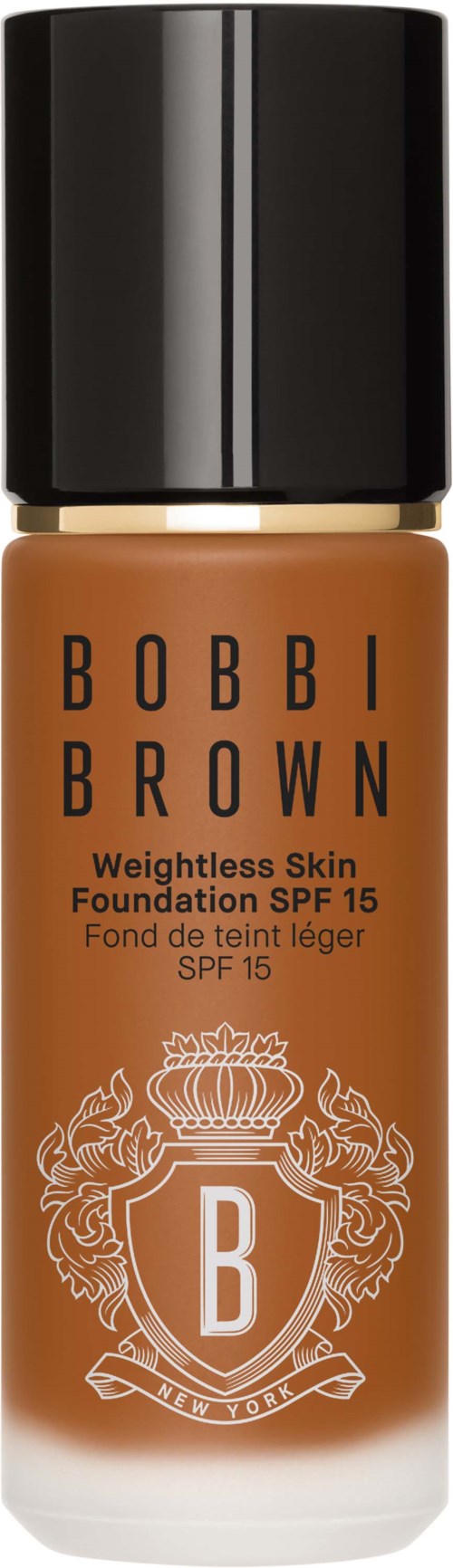 En flaska Bobbi Brown foundation med SPF 15, brun färg, svart lock och vit dekorationsetikett.