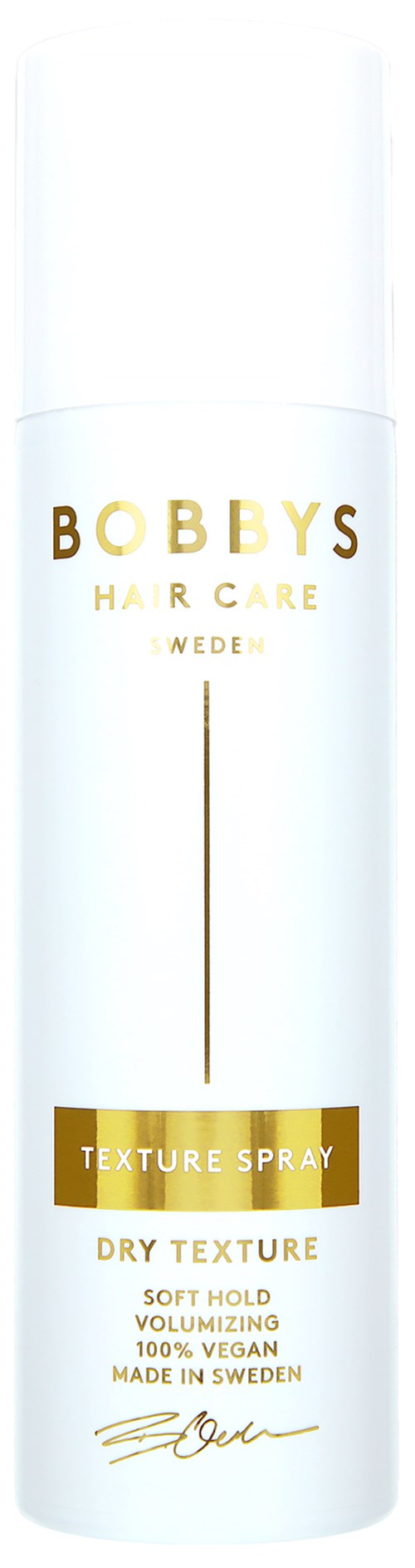 En lång vit flaska med guld- och svart text för Bobby's Hair Care texture spray, påstår att den ger volym och torr struktur.
