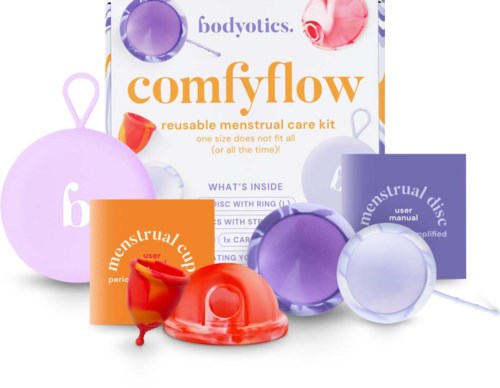 A menstrual care kit with cups, small containers, and a manual, in purple, pink, and orange colors, labeled "comfy flow."