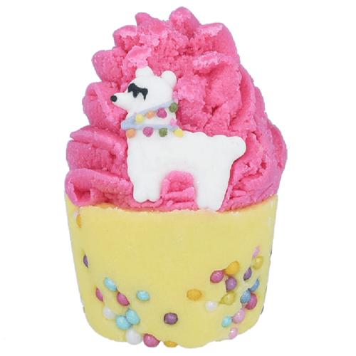 Søt cupcake med rosa frosting, en søt hvit hundetoppar, og fargerike strøssel.