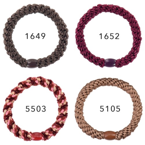 Vier farbige, gestrickte Haargummis mit unterschiedlichen Nummern in eachm Kreis.