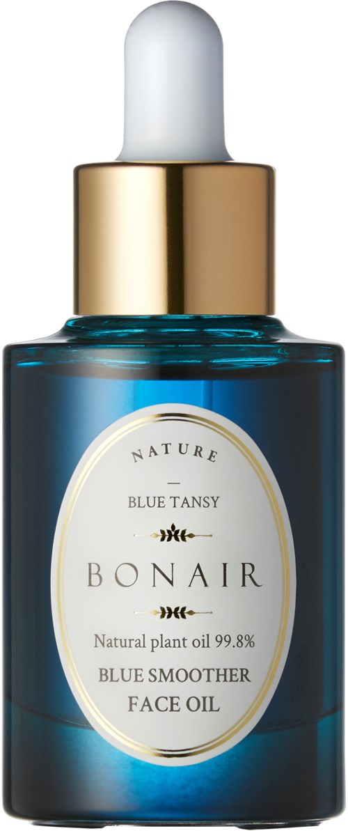 En blå ansiktsoljedroppeflaska med vit pipettlock och guldkant, märkt 'Bonair Blue Smoother Face Oil.'