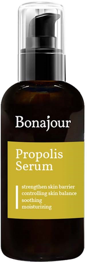 Donkere fles met pomp, labeled 'Bonjour Propolis Serum', belooft de huid te versterken en te hydrateren.