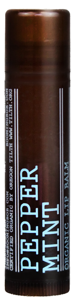 Brzysty sztyft balsamu do ust z niebieskim i białym tekstem, oznaczony 'PEPPER MINT' i 'ORGANIC TINTB PALL'.