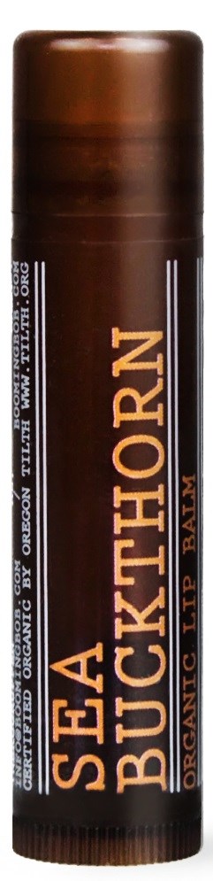 Brązowa, cylindryczna rurka balsamu do ust z złotym i białym tekstem, oznaczona jako Sea Buckthorn Organic Lip Balm.