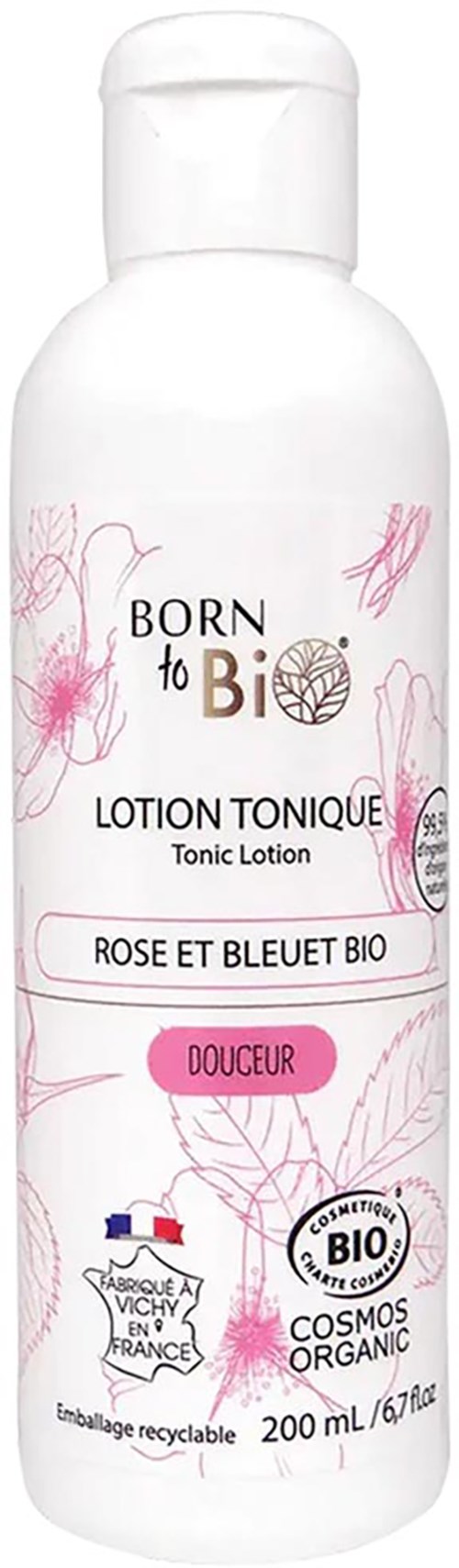 A white bottle of rose-scented organic tonic lotion with pink and black text, and simple leaf illustrations.