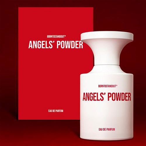 Hajuvesipullo nimeltä Angels' Powder punaisella taustalla. Kuppi on valkoinen ja pyöreä.
