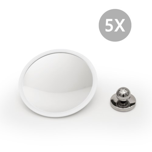 En lille rund spejl og en metalbold på en stand, med en "5X" forstørrelsesetiket.