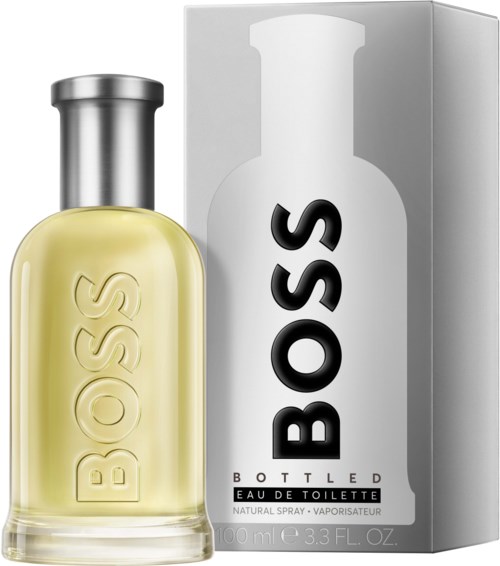 En parfyllflaska med etiketten 'BOSS' bredvid sin box, som säger 'BOTTLED EADE TOILETTE.'