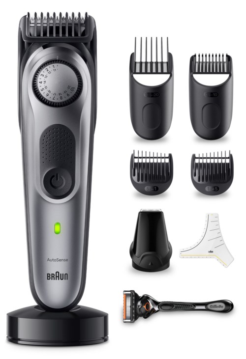 Ett grooming-kit innehåller en elektrisk trimmer, fyra justerbara tillbehör, en rengöringsborste, en stång och ett skydd.