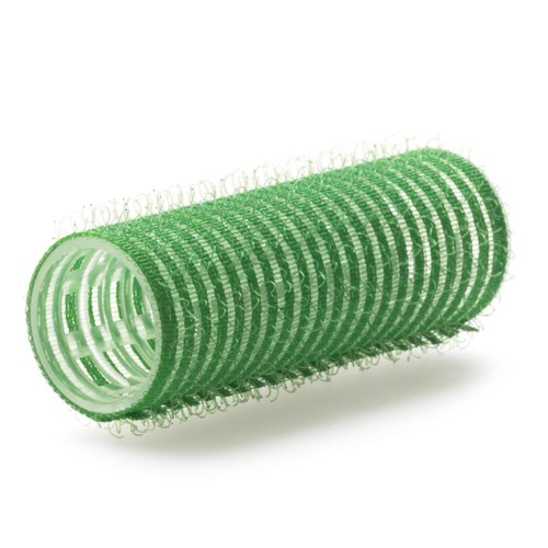 A green hair roller lies horizontally, with a hollow center and many small loops on its surface.