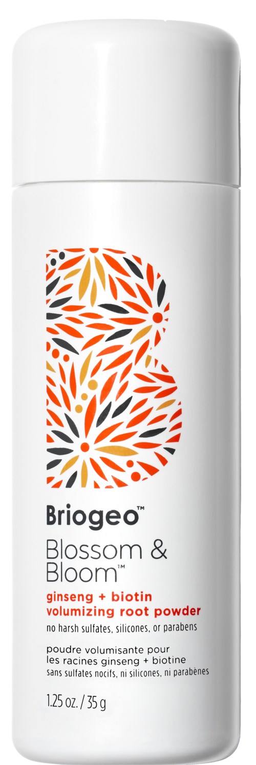 En hvit flaske med fargerik logo og tekst for volumgivende rotpudder, inneholder ginseng og biotin.