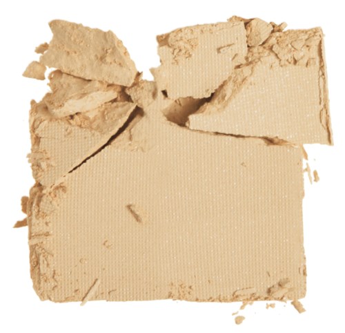 Ett stort, trasigt beige ämne med ojämna bitar och sprucken yta. Ser ut som ett sprött material.