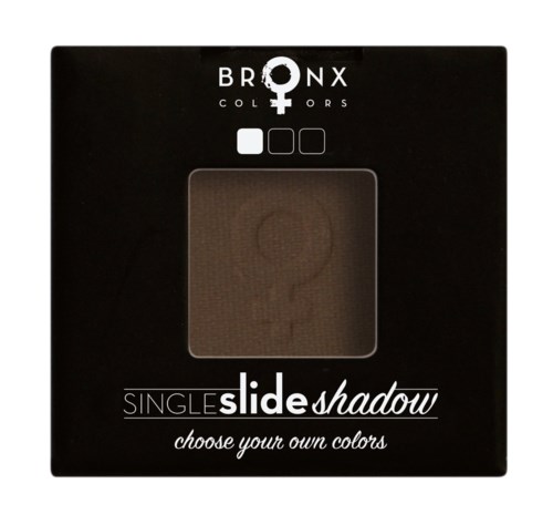 Svart ögonskuggspalett med könssymboler, företagsnamn och produktdetaljer. Den säger "Single slide shadow, choose your own colors."