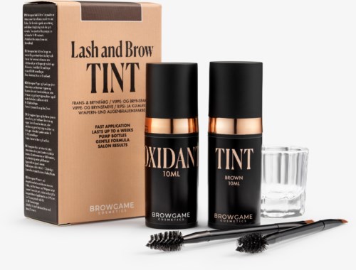 Zwei Flaschen für Augenbrauen- und Wimpern-Farbe, eine Packung, ein kleines Glas und Pinsel für Anwendung.