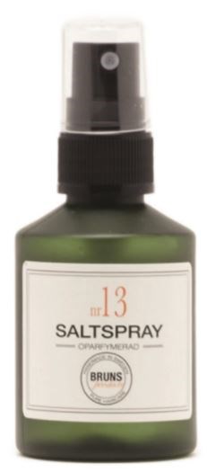 En lille grøn flaske med sprayhoved mærket 'Salt Spray' og nummer 13.