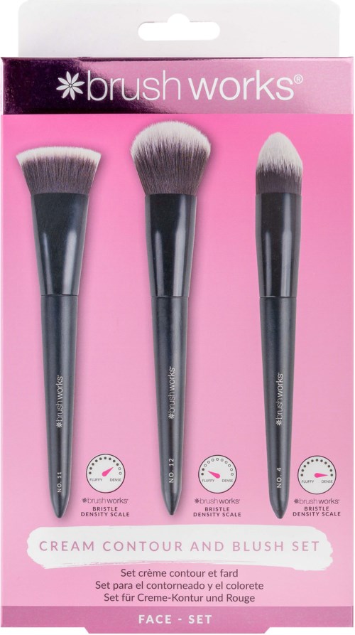Set of three makeup brushes for contouring, blush, and applying powder in a pink and black package.