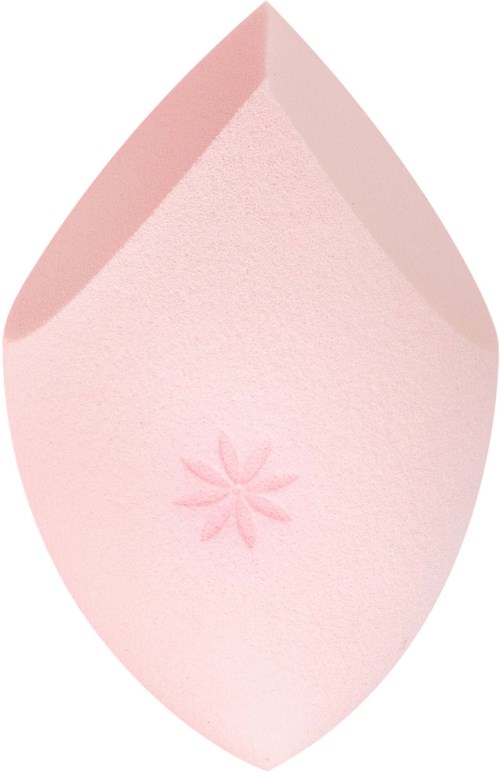 Roter Make-up-Schwamm mit einem Blumenmuster geprägt in der Nähe des Bodens.